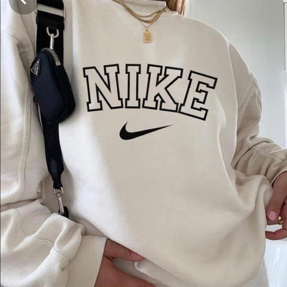White Nike logo sweater